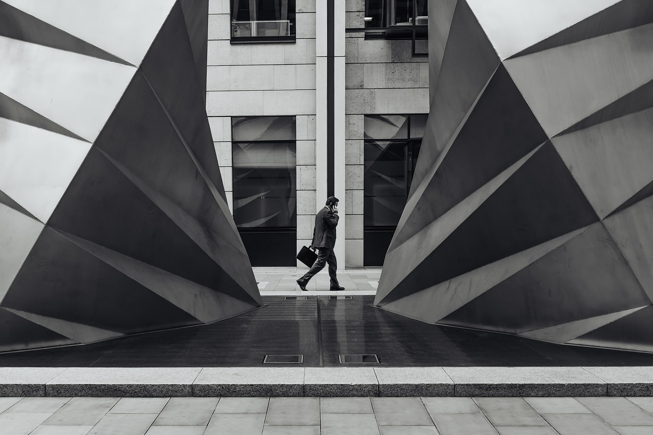 architecture, building, businessman, city, gray, modern, concrete, art installation, man, walking, monochrome, black and white, modern architecture, contemporary architecture, businessman, businessman, businessman, businessman, businessman, concrete