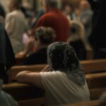 Woman wearing a headscarf in church