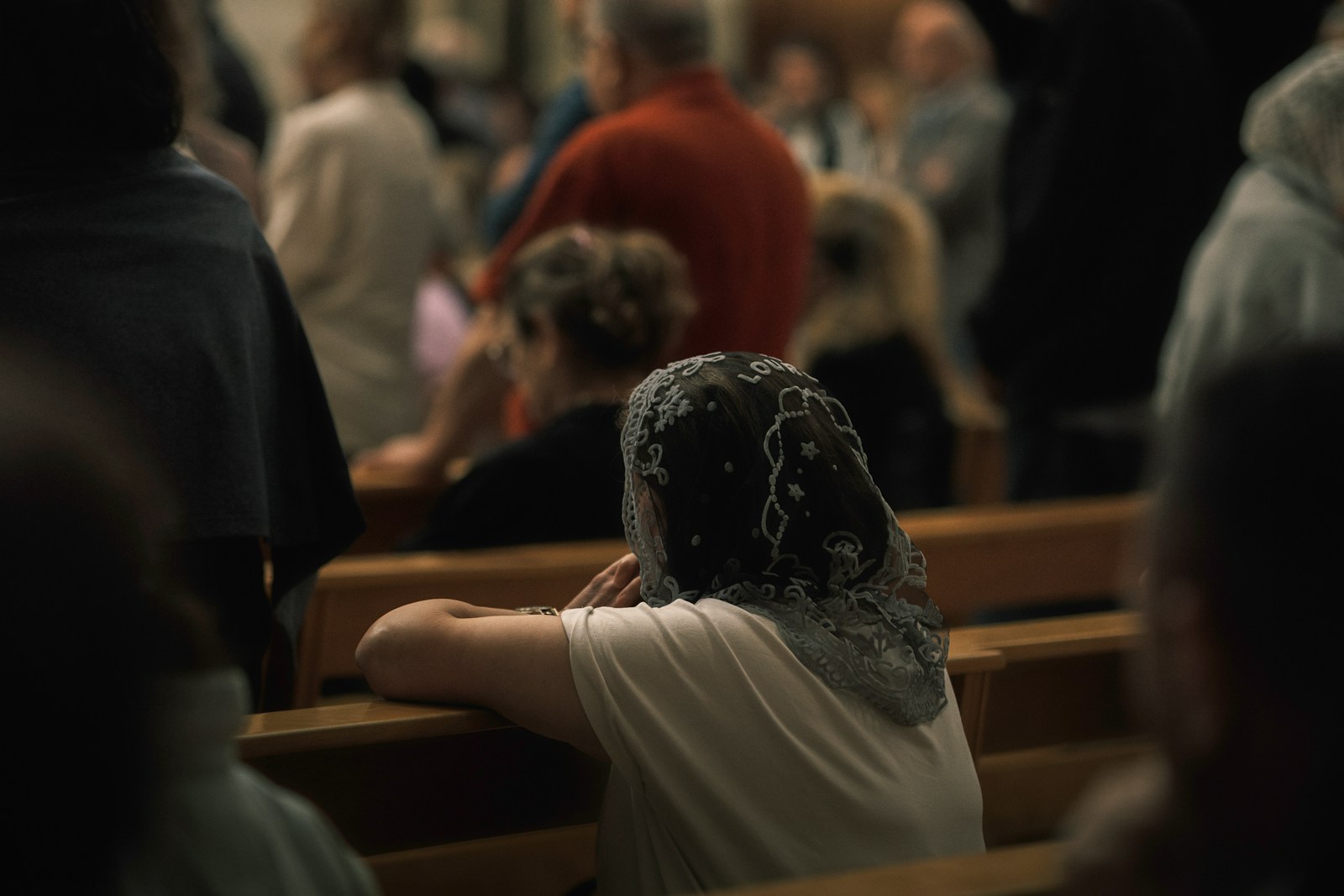 Woman wearing a headscarf in church